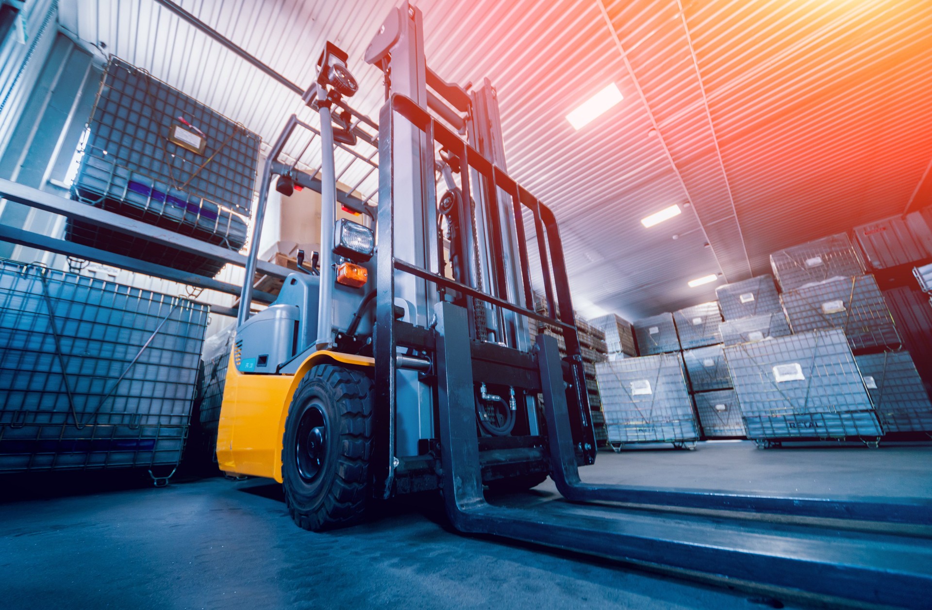 Forklift loader. Pallet stacker truck equipment at warehouse